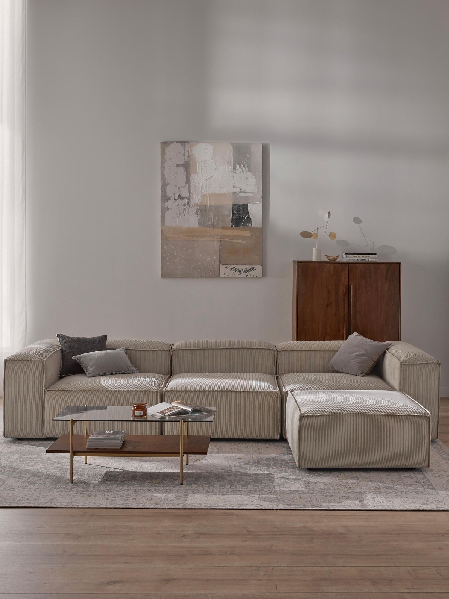 Canapé modulable 4 places en velours côtelé avec pouf Frida