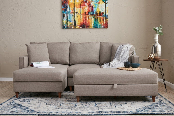 Canapé d'angle à gauche convertible avec pouf-coffre Evania Tissu Taupe