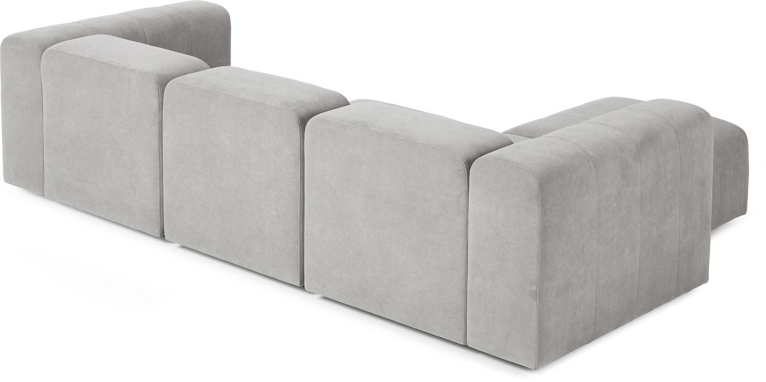 Canapé modulable 4 places en tissu avec pouf Pietro