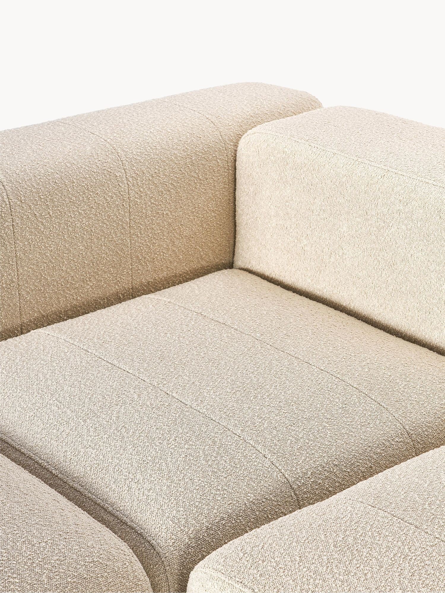 Canapé modulable 4 places en tissu bouclé avec pouf Pietro