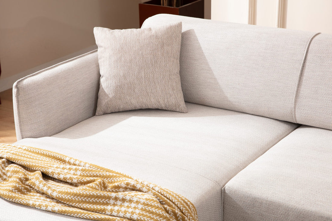 Canapé d'angle à gauche convertible avec 2 coussins Torga Tissu Blanc crème