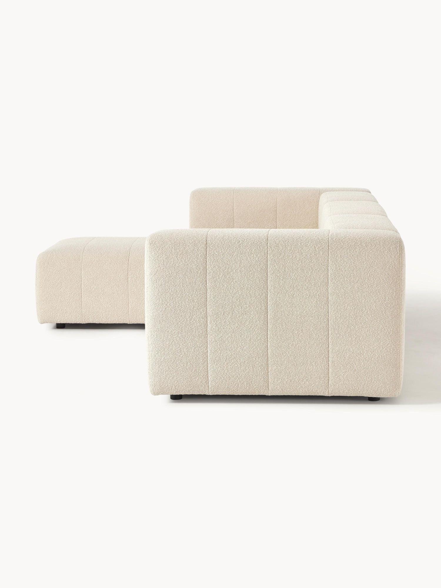 Canapé modulable 4 places en tissu bouclé avec pouf Pietro