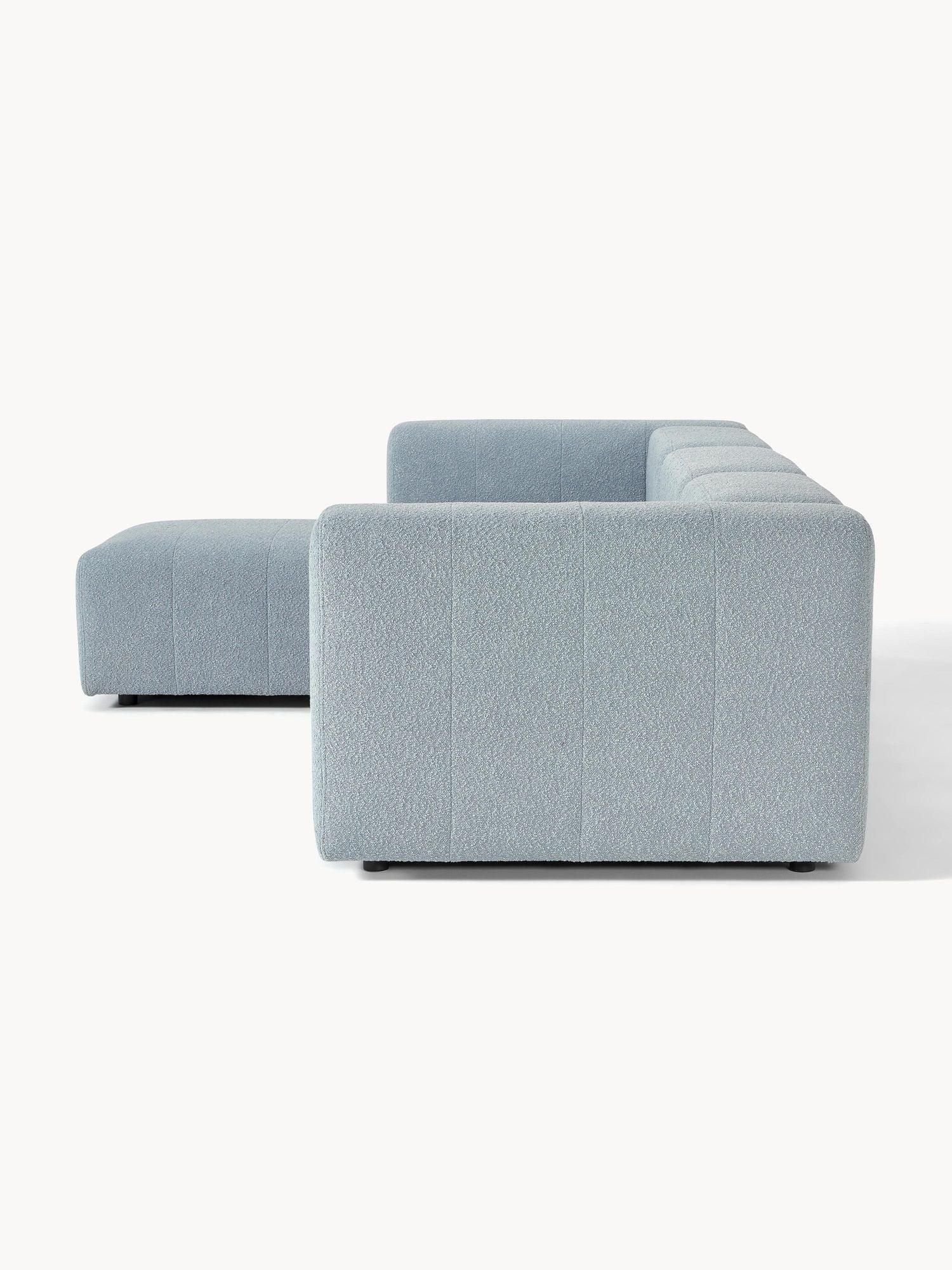 Canapé modulable 4 places en tissu bouclé avec pouf Pietro