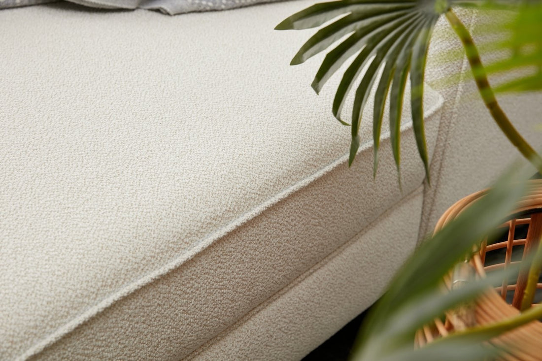 Canapé d'angle moderne Barlino angle à gauche Tissu Crème pieds Noir