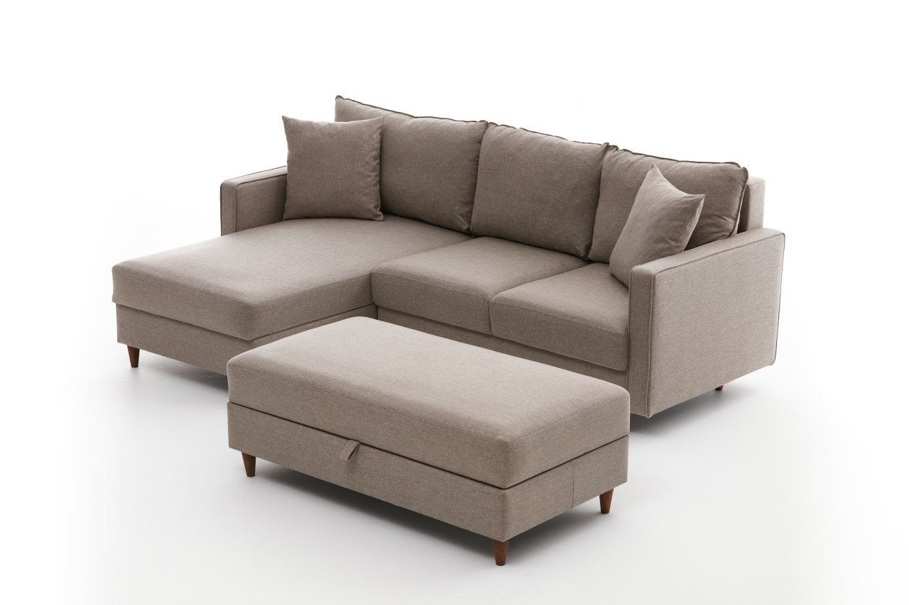 Canapé d'angle à gauche convertible avec pouf-coffre Evania Tissu Taupe