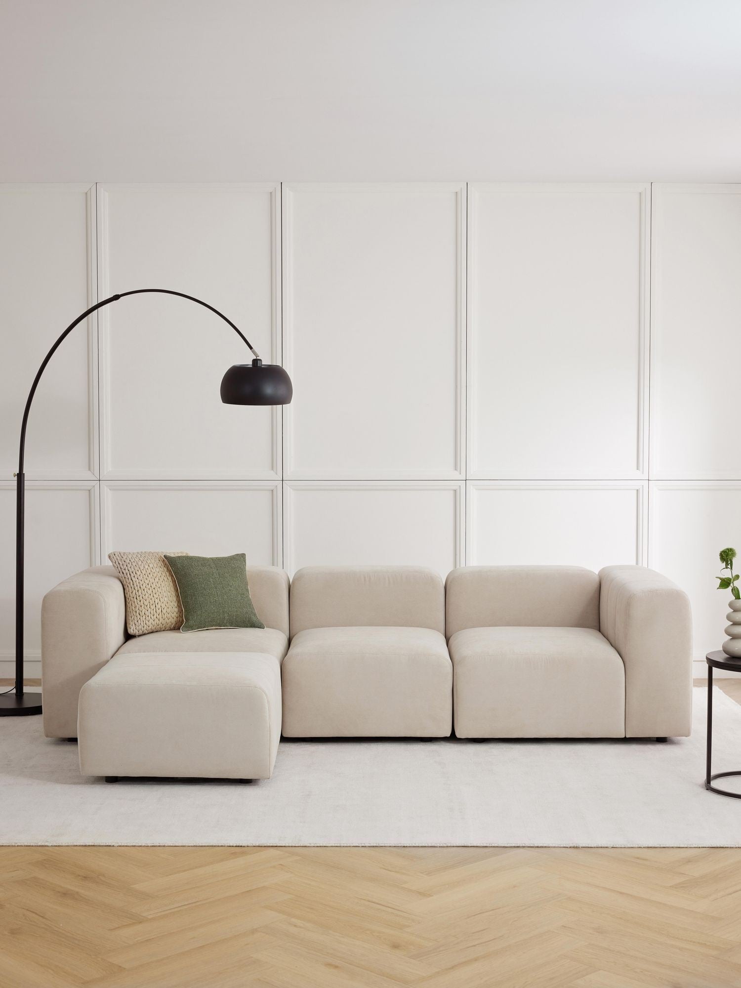 Canapé modulable 4 places en tissu avec pouf Pietro