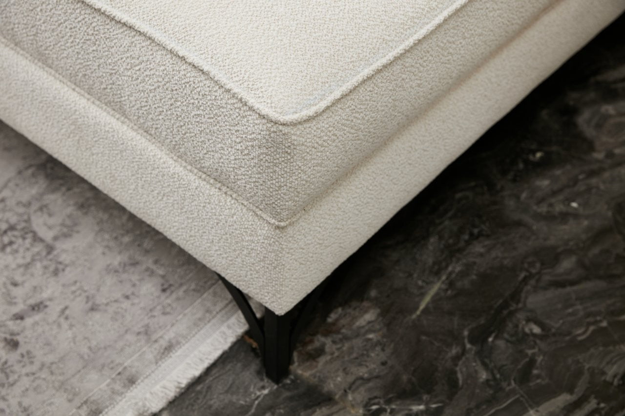 Canapé d'angle moderne Barlino angle à gauche Tissu Crème pieds Noir