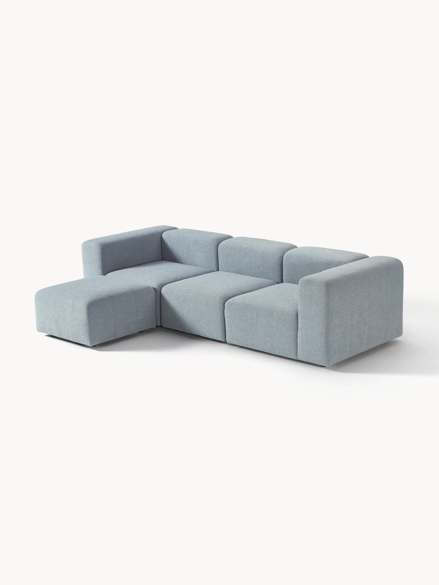 Canapé modulable 4 places en tissu bouclé avec pouf Pietro
