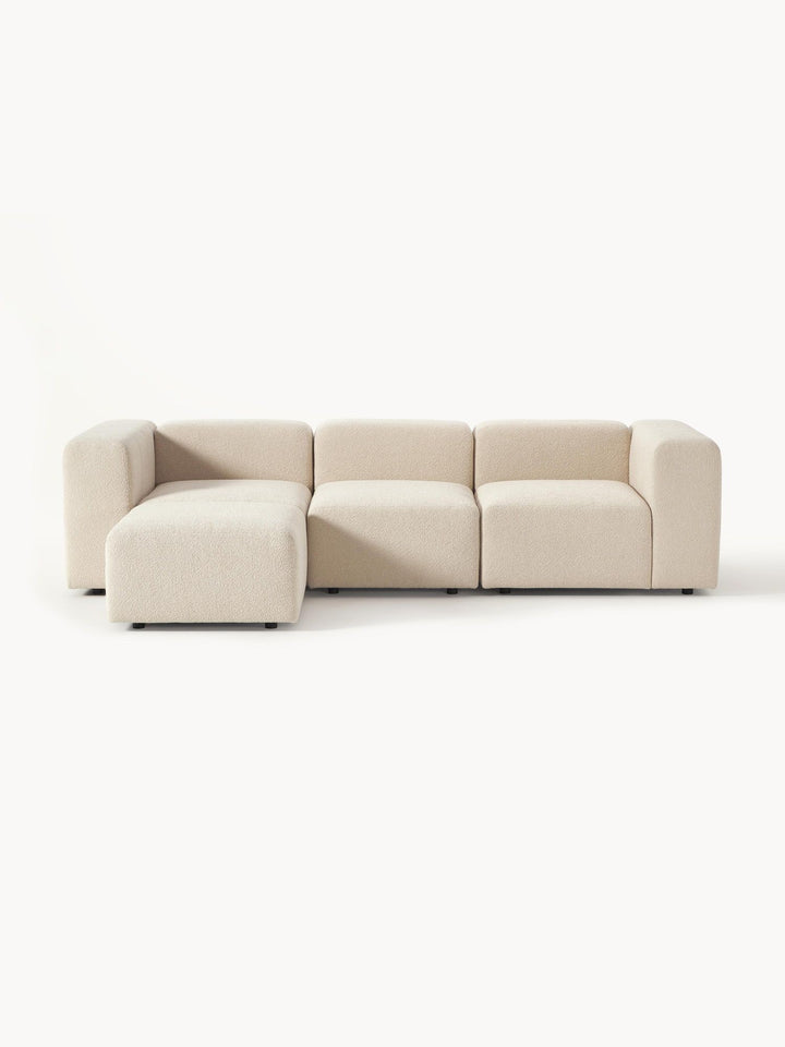 Canapé modulable 4 places en tissu bouclé avec pouf Pietro