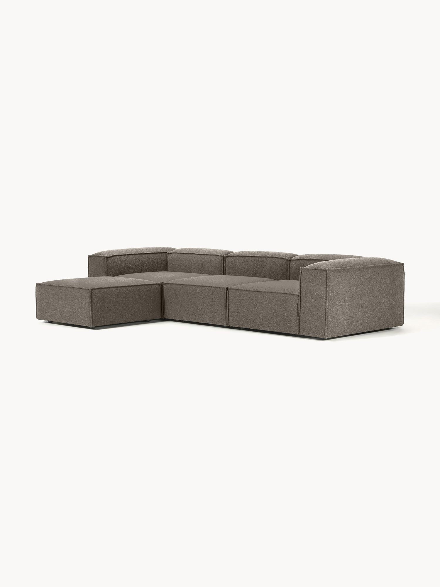 Canapé modulable 4 places en tissu bouclé avec pouf Frida