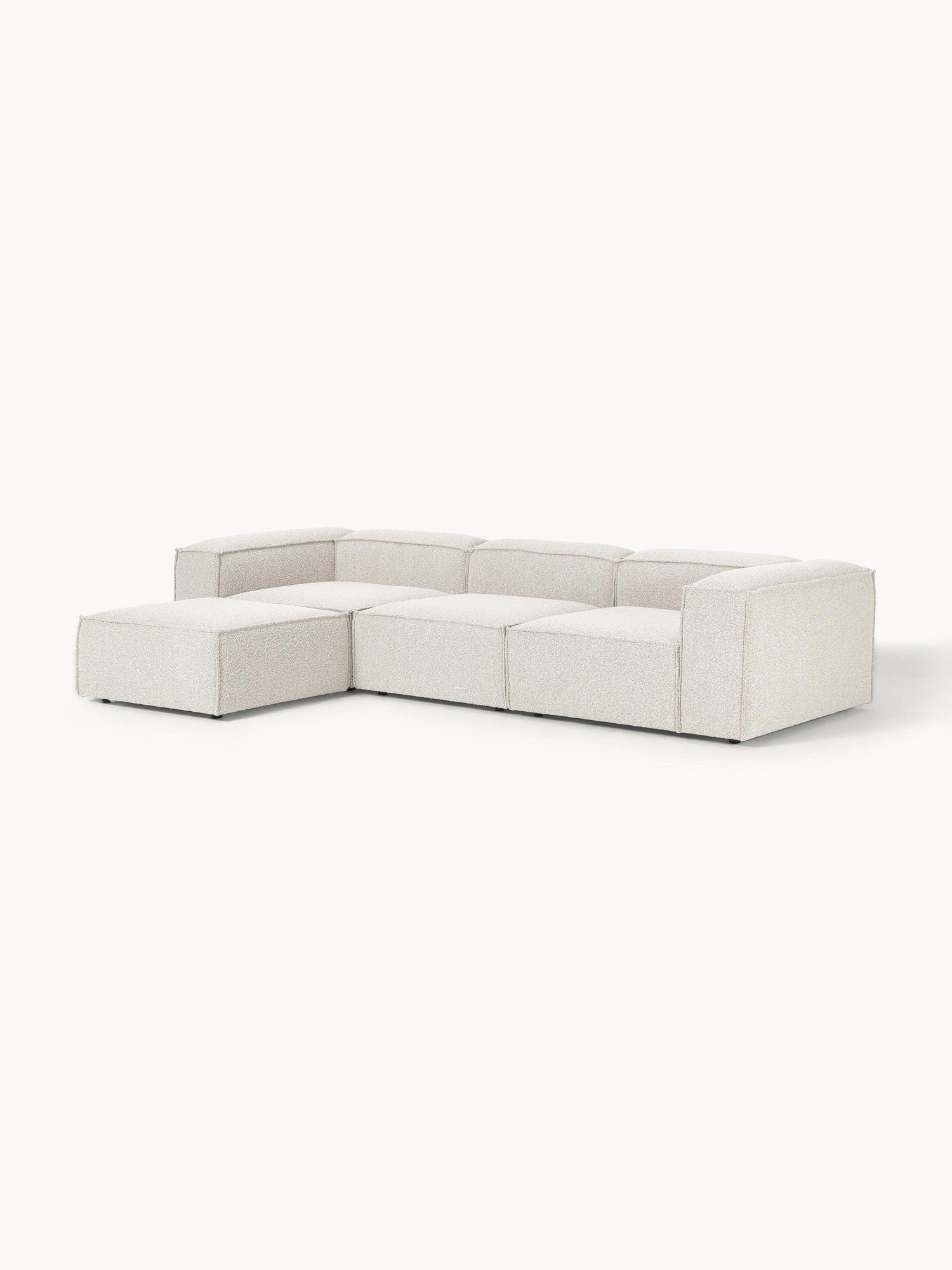 Canapé modulable 4 places en tissu bouclé avec pouf Frida