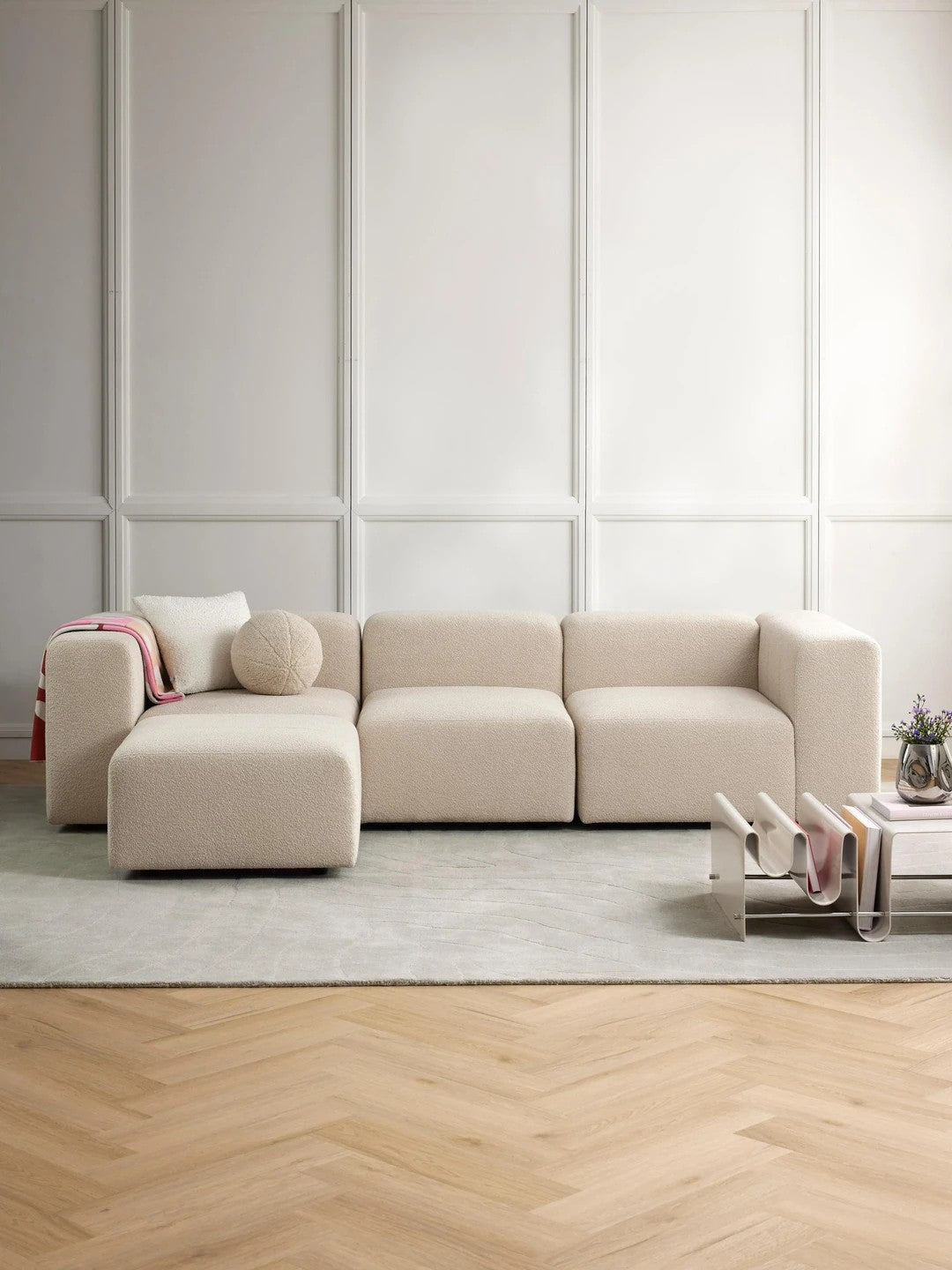 Canapé modulable 4 places en tissu bouclé avec pouf Pietro